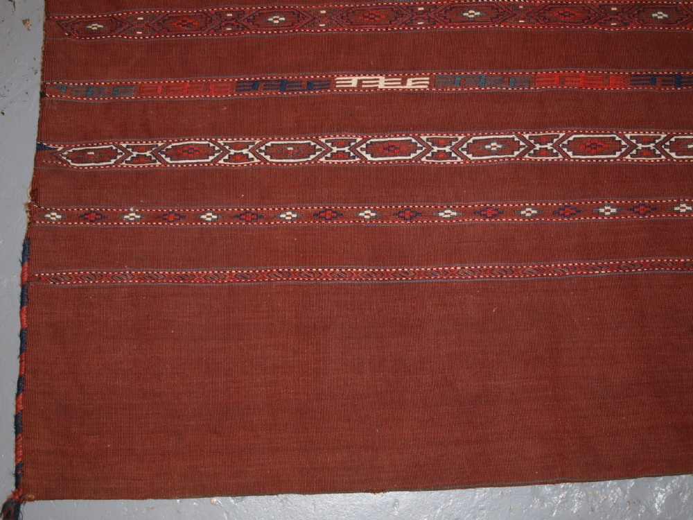 ANTIQUE TEKKE TURKMEN BANDED FLAT WOVEN CHUVAL, COMPLETE WITH BACK, CIRCA 1900. View III