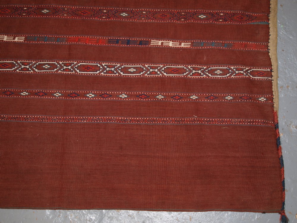 ANTIQUE TEKKE TURKMEN BANDED FLAT WOVEN CHUVAL, COMPLETE WITH BACK, CIRCA 1900. View IV