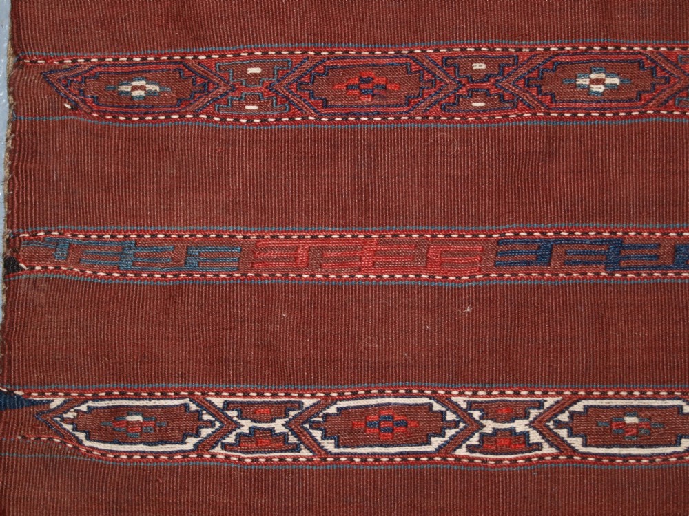 ANTIQUE TEKKE TURKMEN BANDED FLAT WOVEN CHUVAL, COMPLETE WITH BACK, CIRCA 1900. View V
