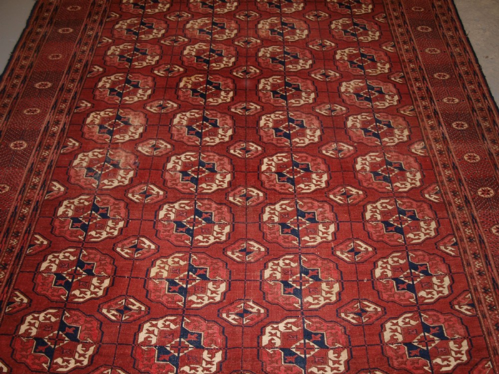 ANTIQUE TEKKE TURKMEN MAIN CARPET, GOOD COLOUR, INTERESTING GULS, LATE 19TH CENTURY. View III