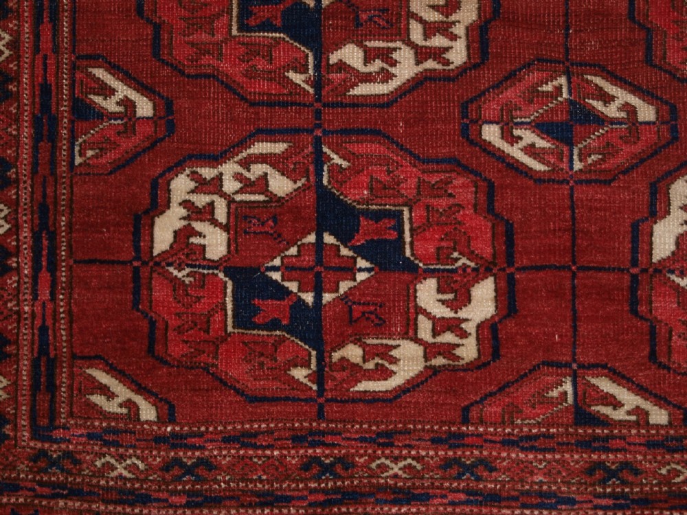 ANTIQUE TEKKE TURKMEN MAIN CARPET, GOOD COLOUR, INTERESTING GULS, LATE 19TH CENTURY. View XI