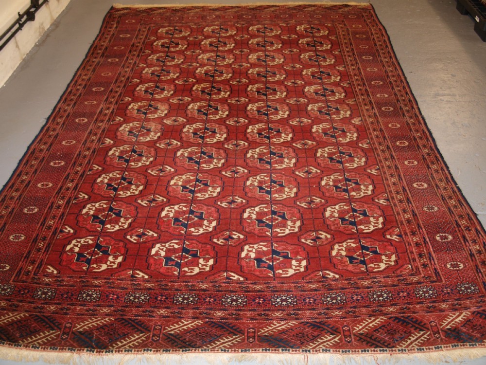 ANTIQUE TEKKE TURKMEN MAIN CARPET, GOOD COLOUR, INTERESTING GULS, LATE 19TH CENTURY. View XII