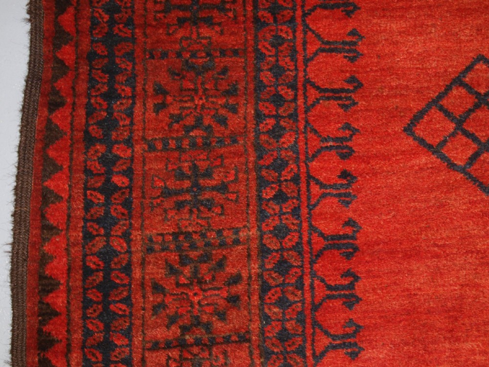 ANTIQUE AFGHAN SULAYMAN ERSARI CARPET OF VERY LARGE SIZE WITH EXCEPTIONAL COLOUR, CIRCA 1900. View V