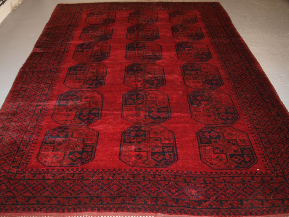 OLD TRADITIONAL RED AFGHAN VILLAGE CARPET, PERFECT CONDITION, CIRCA 1920.
