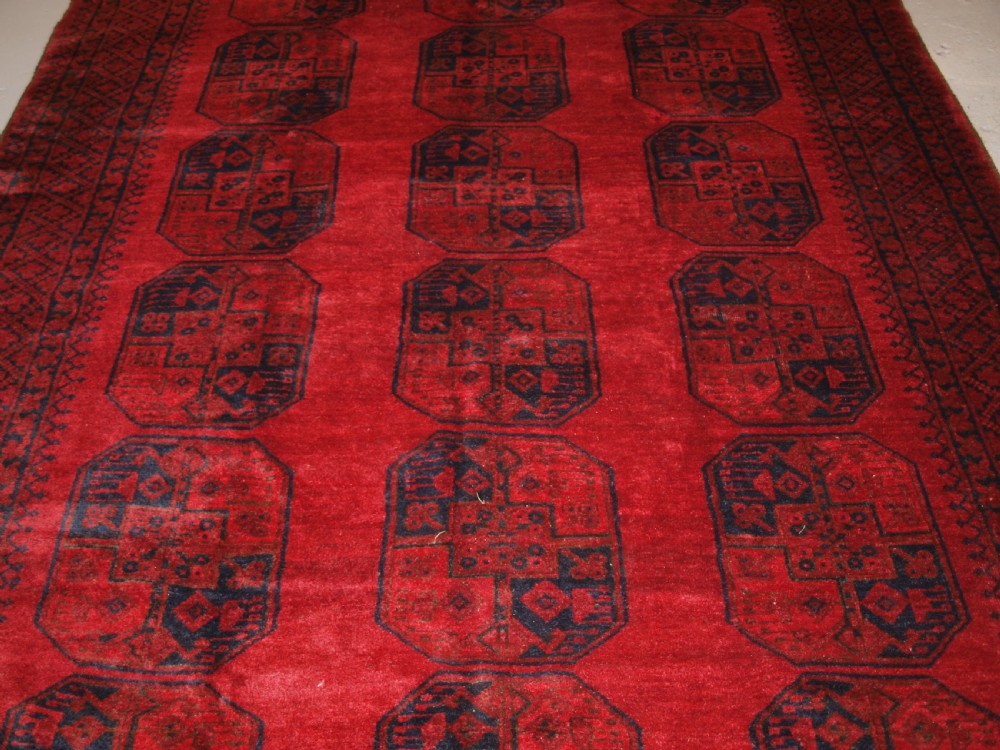 OLD TRADITIONAL RED AFGHAN VILLAGE CARPET, PERFECT CONDITION, CIRCA 1920. View IV