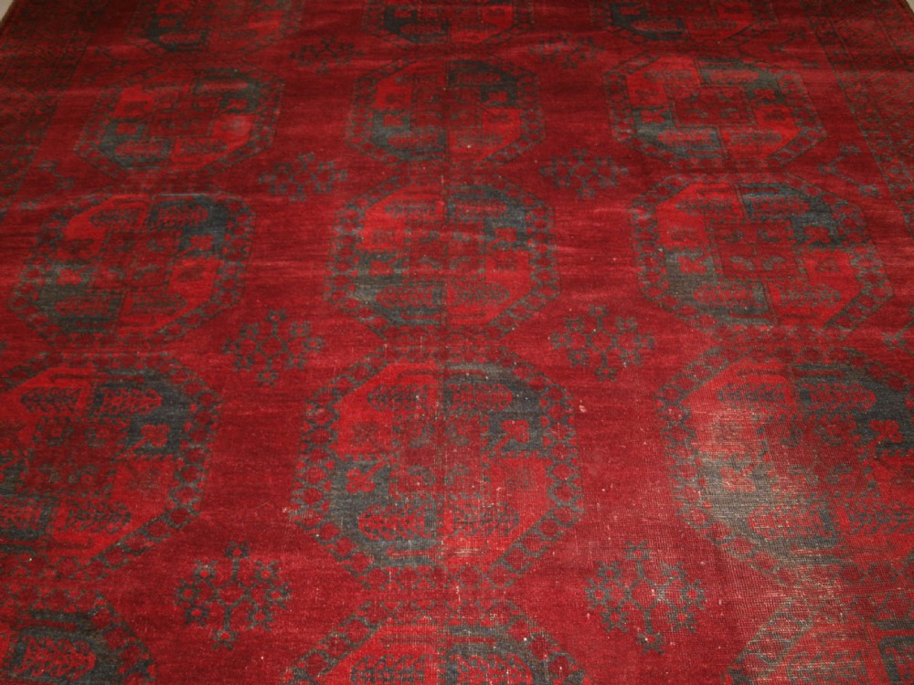 ANTIQUE AFGHAN ERSARI TURKMEN CARPET, DEEP PLUM RED COLOUR, CIRCA 1900. View III
