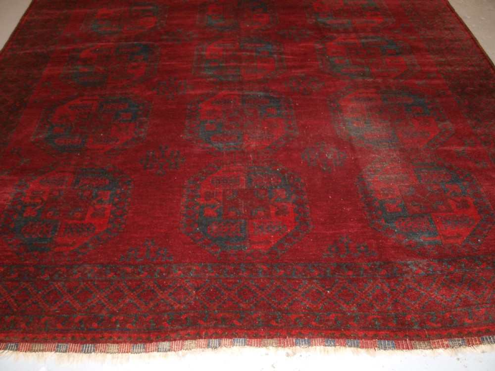 ANTIQUE AFGHAN ERSARI TURKMEN CARPET, DEEP PLUM RED COLOUR, CIRCA 1900. View IV