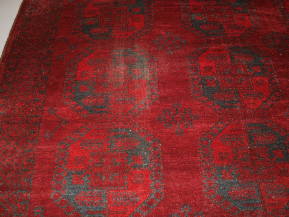ANTIQUE AFGHAN ERSARI TURKMEN CARPET, DEEP PLUM RED COLOUR, CIRCA 1900. View VII
