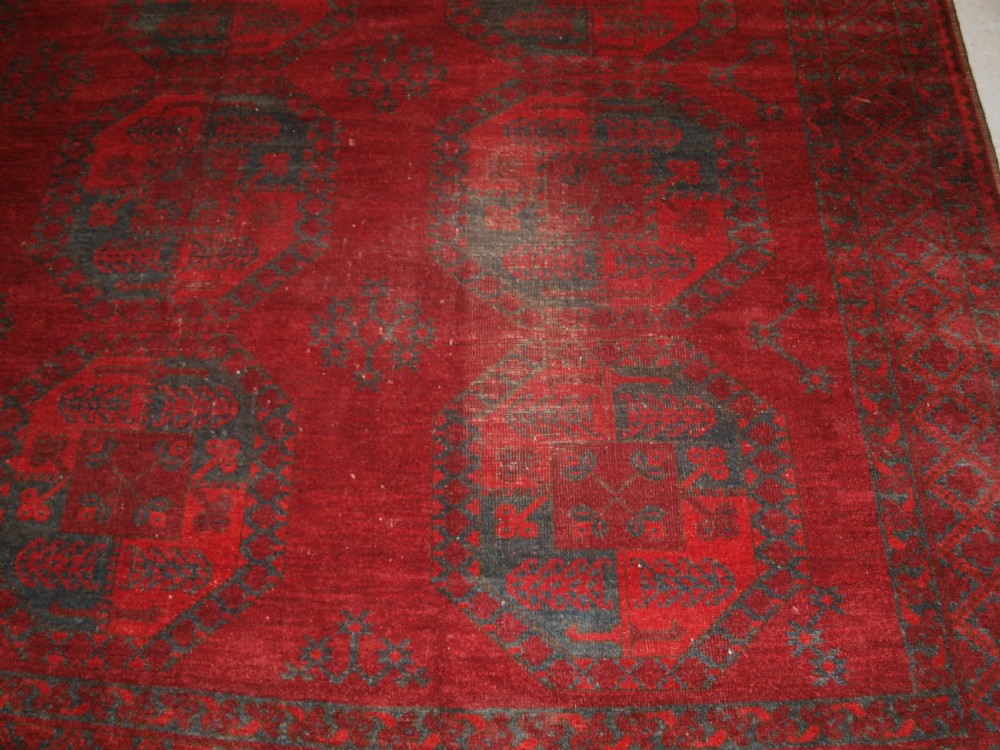 ANTIQUE AFGHAN ERSARI TURKMEN CARPET, DEEP PLUM RED COLOUR, CIRCA 1900. View VIII