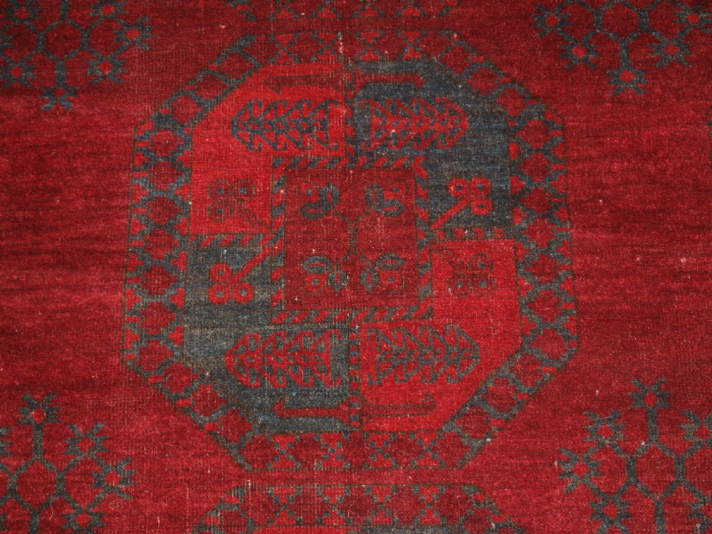 ANTIQUE AFGHAN ERSARI TURKMEN CARPET, DEEP PLUM RED COLOUR, CIRCA 1900. View IX