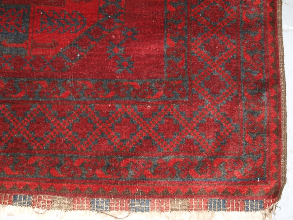 ANTIQUE AFGHAN ERSARI TURKMEN CARPET, DEEP PLUM RED COLOUR, CIRCA 1900. View XII