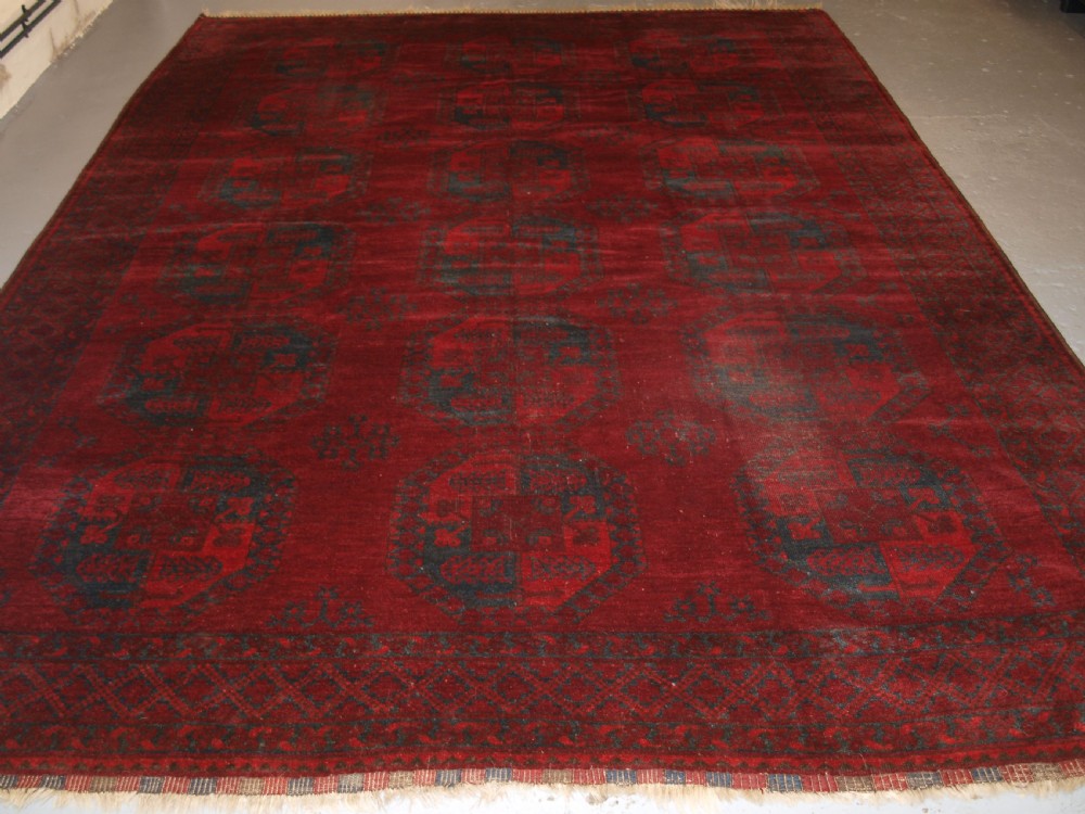 ANTIQUE AFGHAN ERSARI TURKMEN CARPET, DEEP PLUM RED COLOUR, CIRCA 1900. View XIII