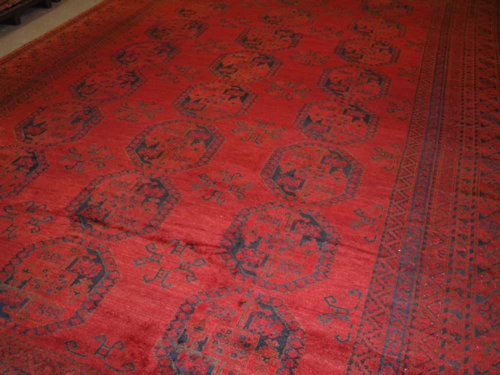 ANTIQUE AFGHAN ERSARI CARPET OF VERY LARGE SIZE WITH SUPERB ROSE MADDER COLOUR, CIRCA 1900. View II