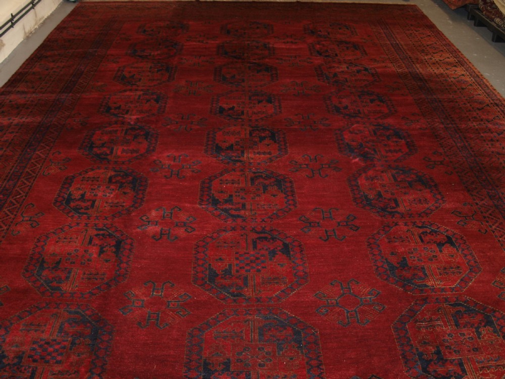 ANTIQUE AFGHAN ERSARI CARPET OF VERY LARGE SIZE WITH SUPERB ROSE MADDER COLOUR, CIRCA 1900. View III