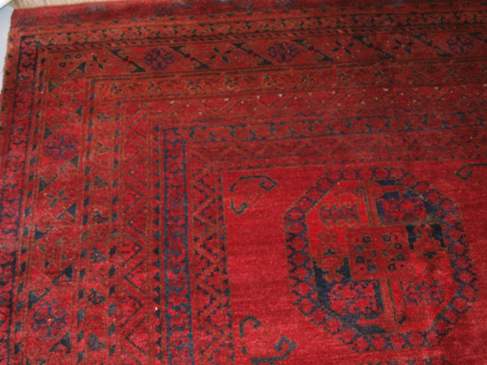 ANTIQUE AFGHAN ERSARI CARPET OF VERY LARGE SIZE WITH SUPERB ROSE MADDER COLOUR, CIRCA 1900. View V