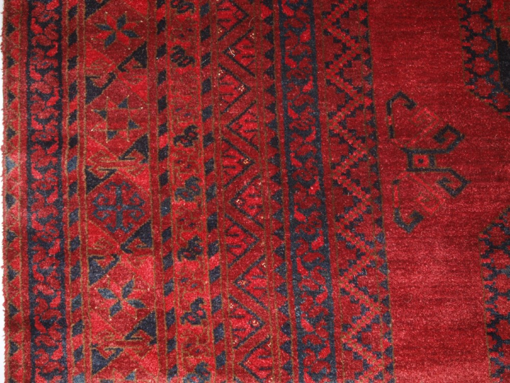 ANTIQUE AFGHAN ERSARI CARPET OF VERY LARGE SIZE WITH SUPERB ROSE MADDER COLOUR, CIRCA 1900. View VI
