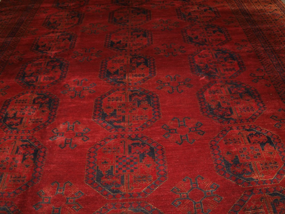 ANTIQUE AFGHAN ERSARI CARPET OF VERY LARGE SIZE WITH SUPERB ROSE MADDER COLOUR, CIRCA 1900. View VIII