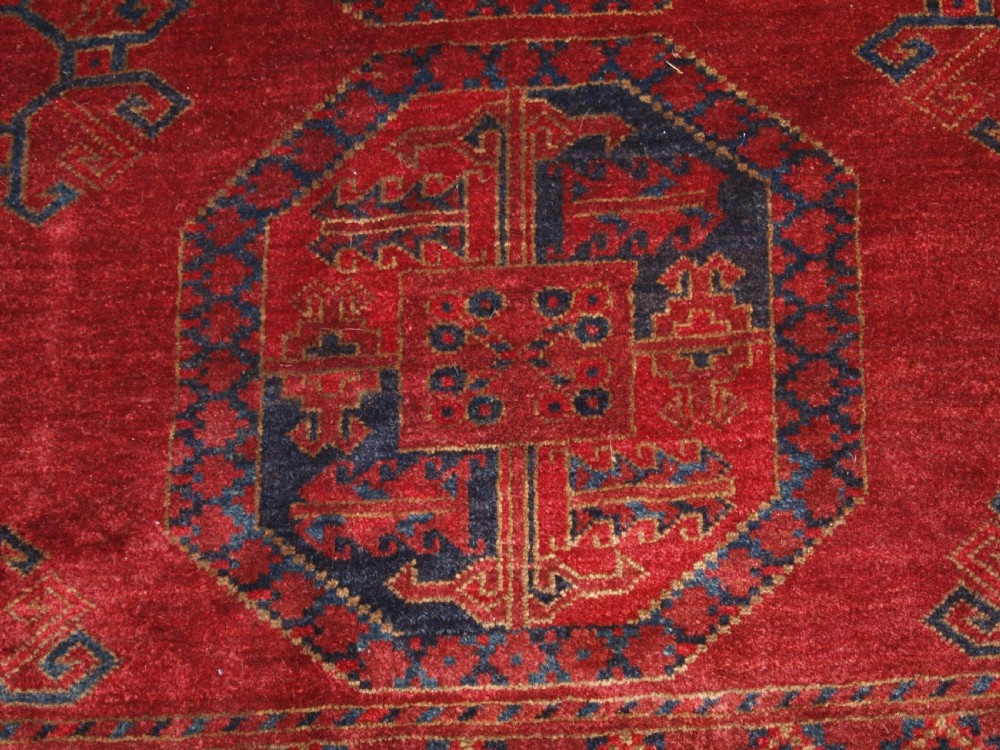 ANTIQUE AFGHAN ERSARI CARPET OF VERY LARGE SIZE WITH SUPERB ROSE MADDER COLOUR, CIRCA 1900. View IX