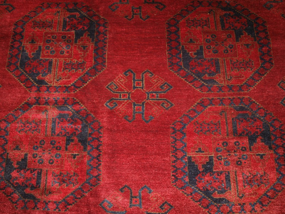 ANTIQUE AFGHAN ERSARI CARPET OF VERY LARGE SIZE WITH SUPERB ROSE MADDER COLOUR, CIRCA 1900. View XII