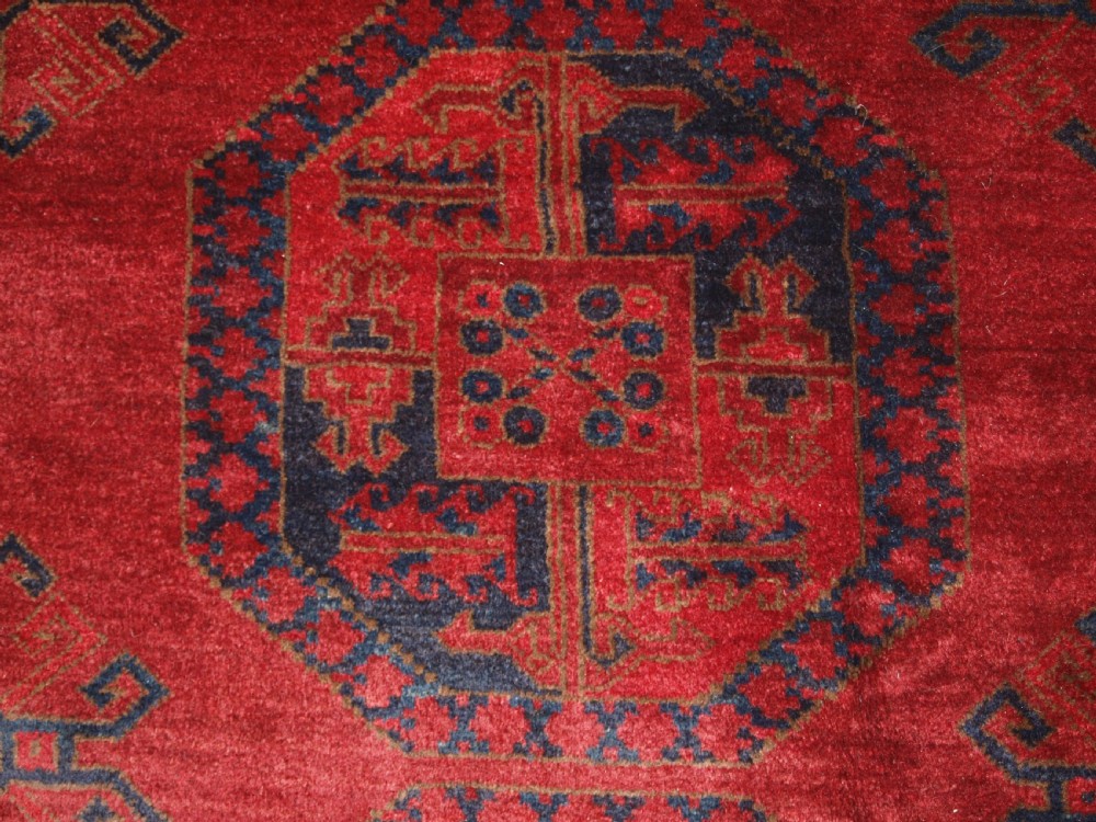 ANTIQUE AFGHAN ERSARI CARPET OF VERY LARGE SIZE WITH SUPERB ROSE MADDER COLOUR, CIRCA 1900. View XV