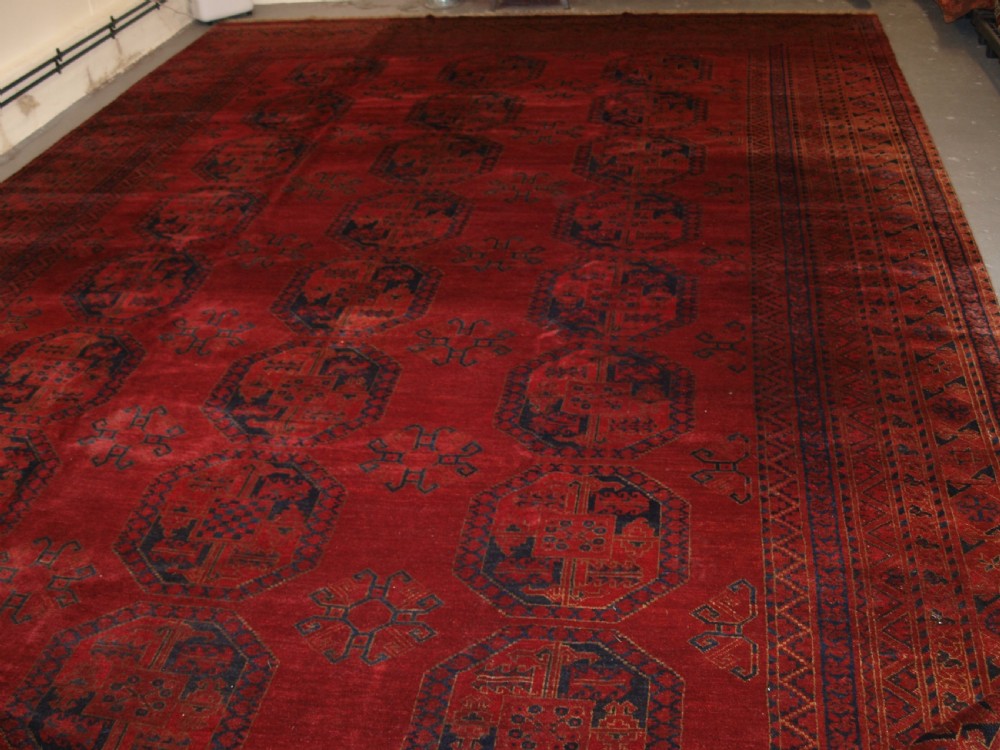 ANTIQUE AFGHAN ERSARI CARPET OF VERY LARGE SIZE WITH SUPERB ROSE MADDER COLOUR, CIRCA 1900. View XVI