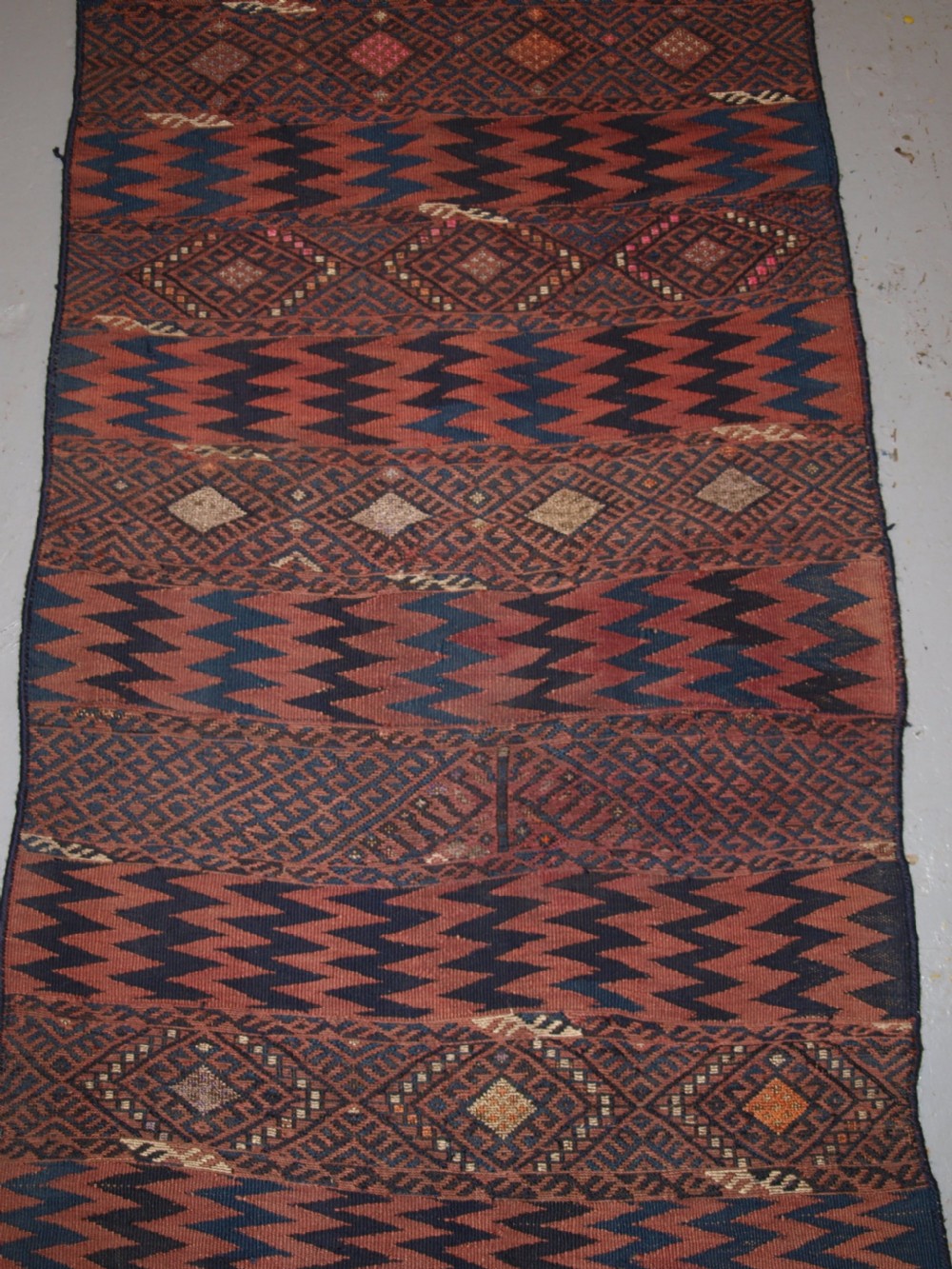 OLD EASTERN TURKISH KILIM RUNNER BY THE HERKI TRIBE, WEFT WORK DECORATION, CIRCA 1920. View III