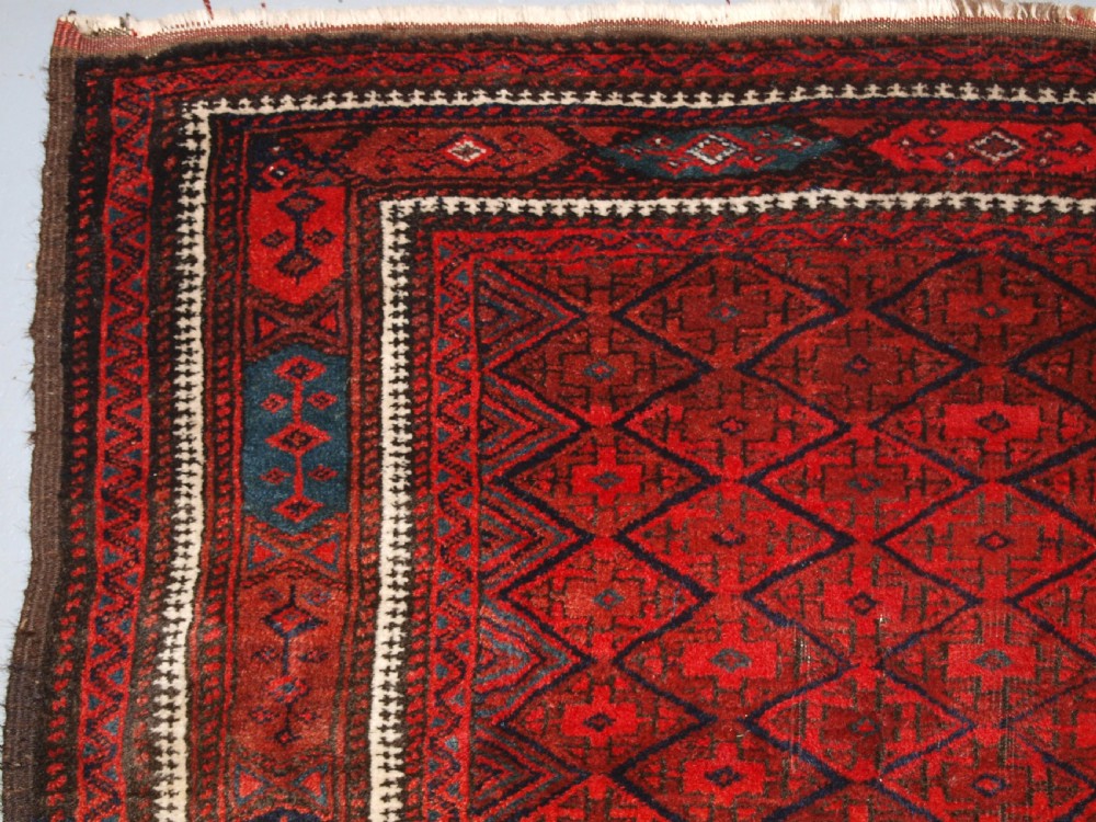 ANTIQUE BALUCH RUG WITH FINE DIAMOND LATTICE DESIGN, INTERESTING BORDER, CIRCA 1900. View III