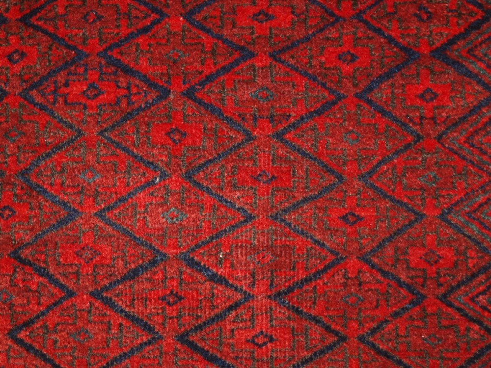 ANTIQUE BALUCH RUG WITH FINE DIAMOND LATTICE DESIGN, INTERESTING BORDER, CIRCA 1900. View VIII