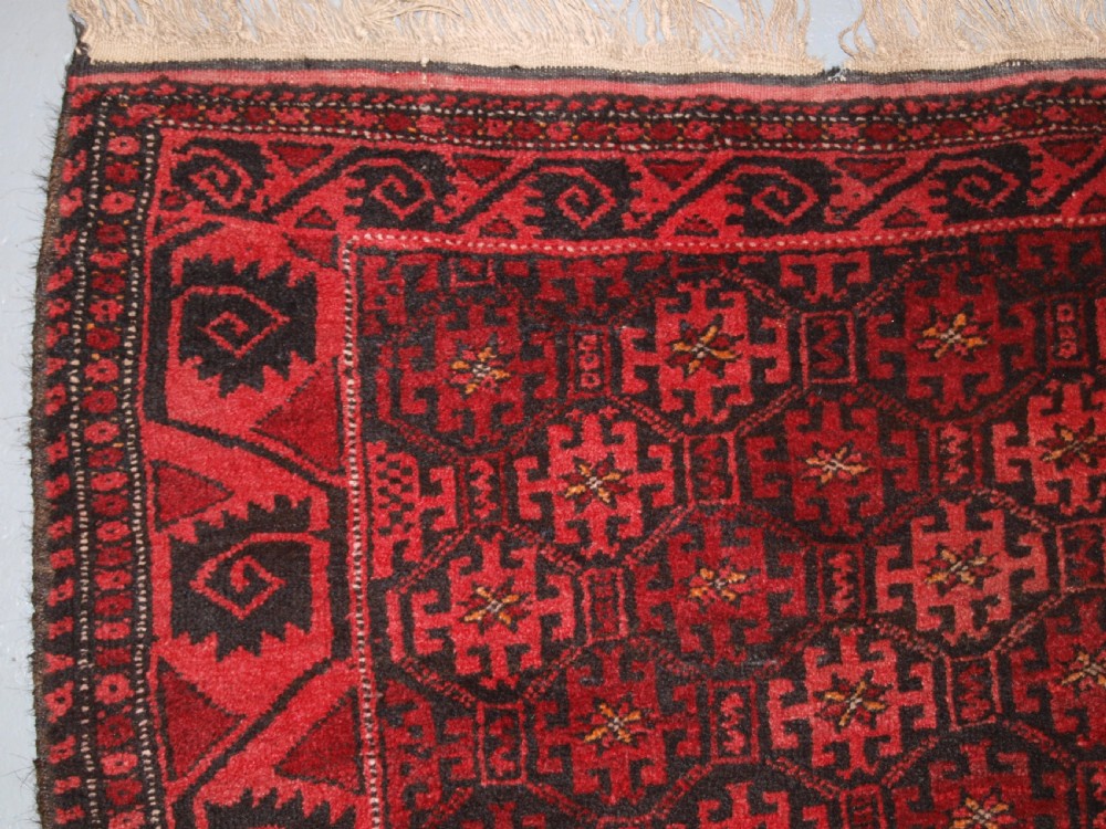 OLD AFGHAN RUG WITH REPEAT DESIGN, CURL LEAF BORDER, RUSTIC CHARM, CIRCA 1920. View II