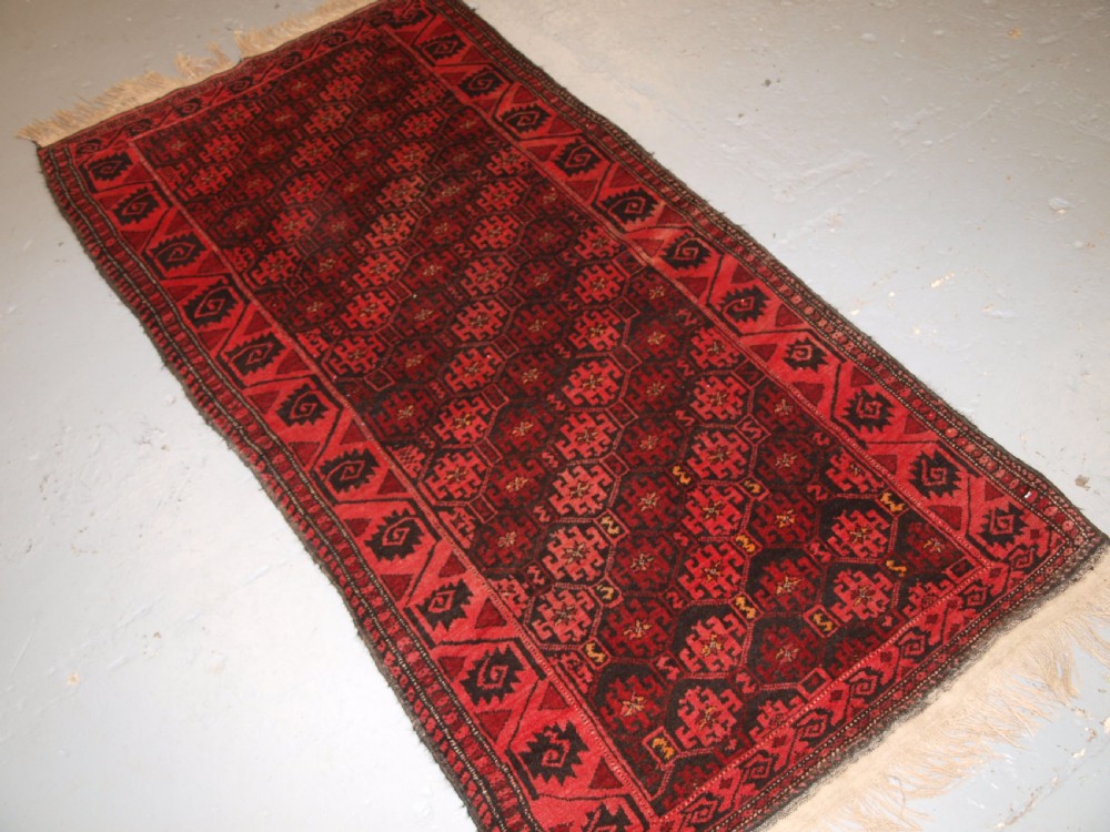 OLD AFGHAN RUG WITH REPEAT DESIGN, CURL LEAF BORDER, RUSTIC CHARM, CIRCA 1920. View III