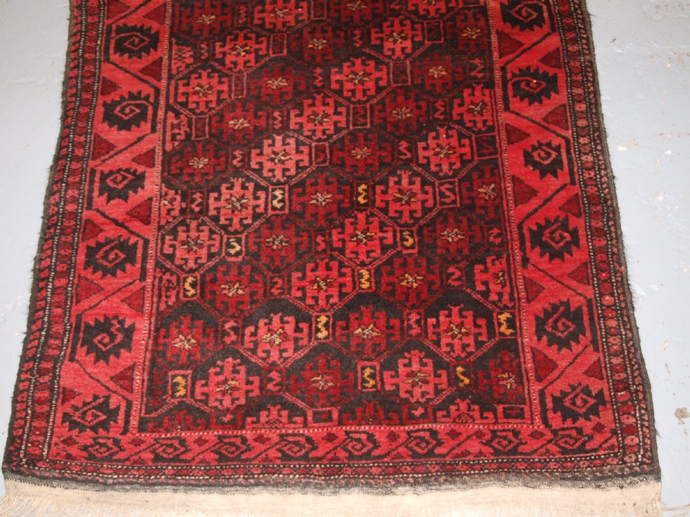OLD AFGHAN RUG WITH REPEAT DESIGN, CURL LEAF BORDER, RUSTIC CHARM, CIRCA 1920. View VI