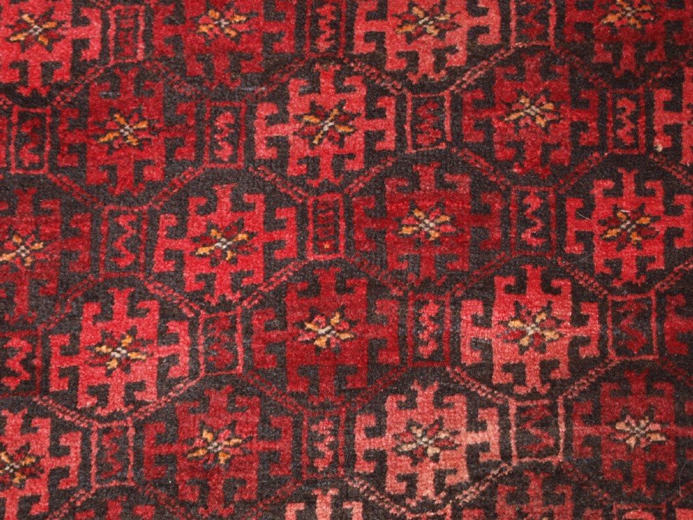 OLD AFGHAN RUG WITH REPEAT DESIGN, CURL LEAF BORDER, RUSTIC CHARM, CIRCA 1920. View IX