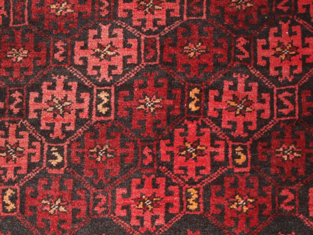 OLD AFGHAN RUG WITH REPEAT DESIGN, CURL LEAF BORDER, RUSTIC CHARM, CIRCA 1920. View X