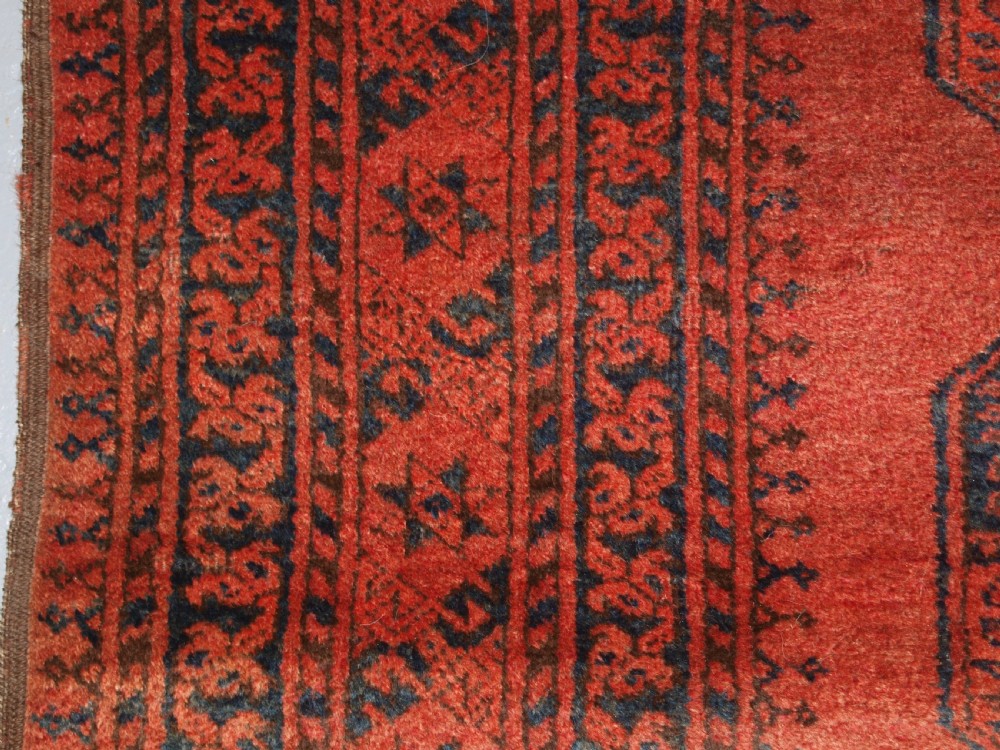 OLD NORTH AFGHAN VILLAGE RUG WITH SUPERB COLOUR, LOW PRICE DUE TO OLD REPAIR, CIRCA 1920. View IV