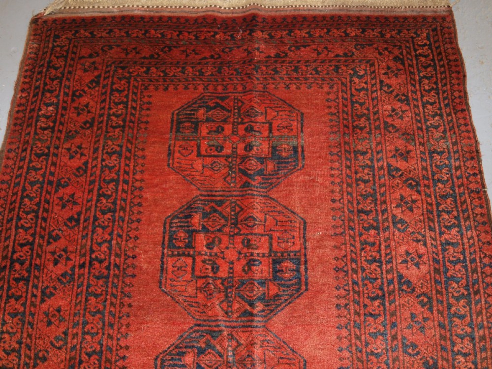 OLD NORTH AFGHAN VILLAGE RUG WITH SUPERB COLOUR, LOW PRICE DUE TO OLD REPAIR, CIRCA 1920. View V