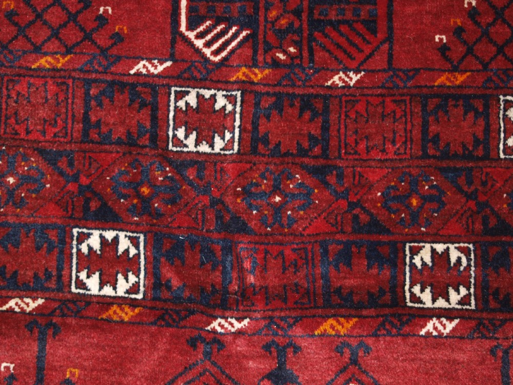 OLD AFGHAN VILLAGE RUG WITH ERSARI TURKMEN ENSI DESIGN, CIRCA 1920. View VIII