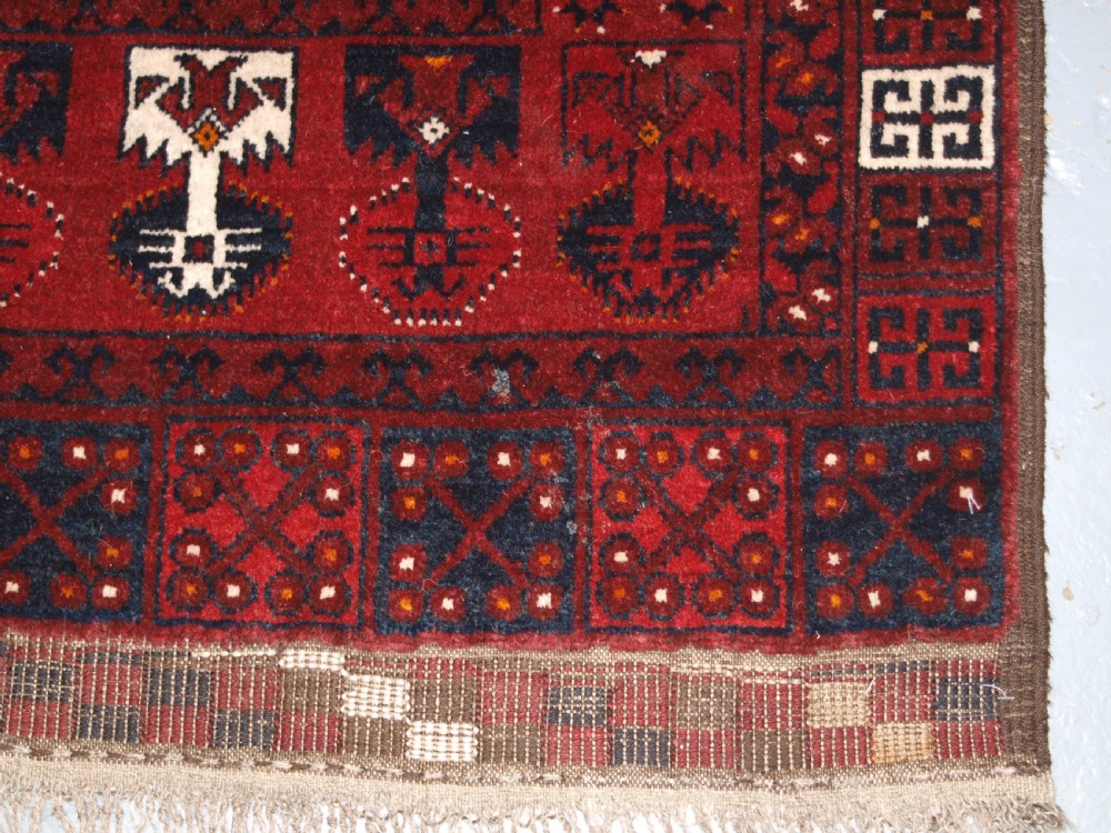 OLD AFGHAN VILLAGE RUG WITH ERSARI TURKMEN ENSI DESIGN, CIRCA 1920. View X