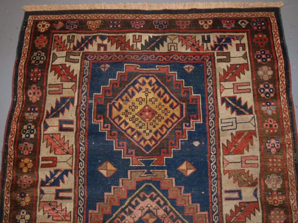 ANTIQUE CAUCASIAN KAZAK THREE MEDALLION RUG WITH SUPERB SOFT COLOURS, CIRCA 1900. View III