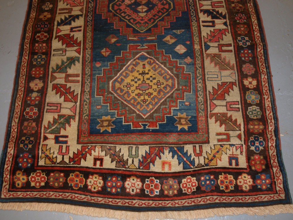 ANTIQUE CAUCASIAN KAZAK THREE MEDALLION RUG WITH SUPERB SOFT COLOURS, CIRCA 1900. View V