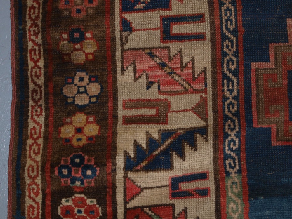 ANTIQUE CAUCASIAN KAZAK THREE MEDALLION RUG WITH SUPERB SOFT COLOURS, CIRCA 1900. View VII