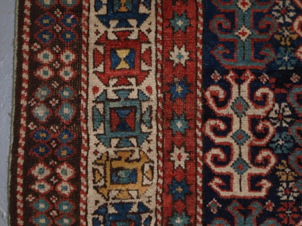 ANTIQUE CAUCASIAN LONG RUG WITH SCARCE DESIGN, PROBABLY GENDJE REGION, LATE 19TH CENTURY. View II