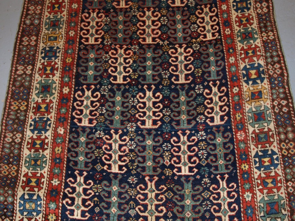 ANTIQUE CAUCASIAN LONG RUG WITH SCARCE DESIGN, PROBABLY GENDJE REGION, LATE 19TH CENTURY. View V