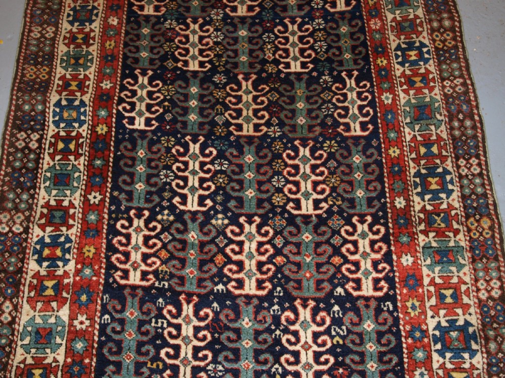 ANTIQUE CAUCASIAN LONG RUG WITH SCARCE DESIGN, PROBABLY GENDJE REGION, LATE 19TH CENTURY. View VI