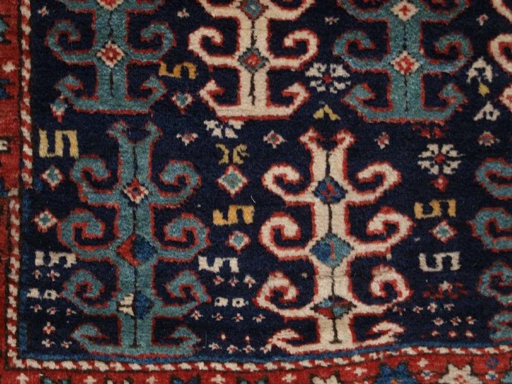 ANTIQUE CAUCASIAN LONG RUG WITH SCARCE DESIGN, PROBABLY GENDJE REGION, LATE 19TH CENTURY. View VIII
