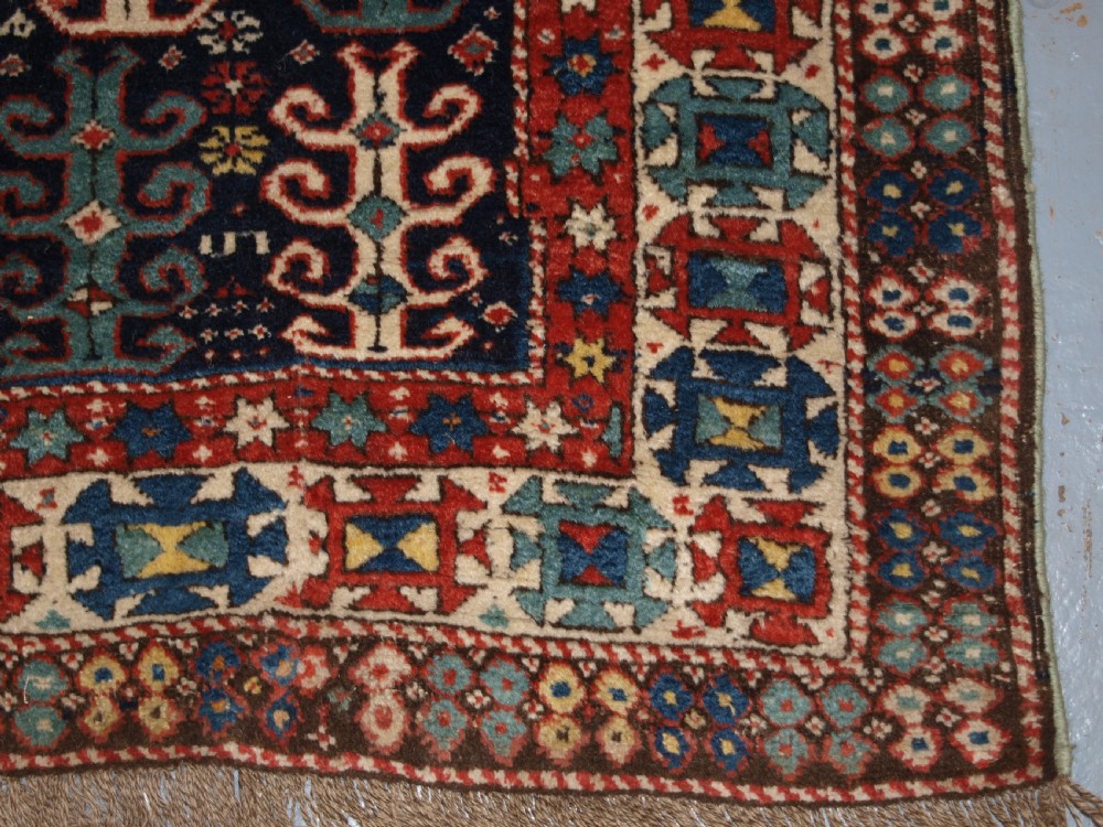 ANTIQUE CAUCASIAN LONG RUG WITH SCARCE DESIGN, PROBABLY GENDJE REGION, LATE 19TH CENTURY. View X