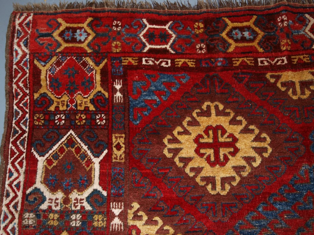 VERY RARE SMALL MAIN CARPET, CENTRAL ASIAN KIRGHYZ OR TURKMEN, MID 19TH CENTURY OR EARLIER. View IV