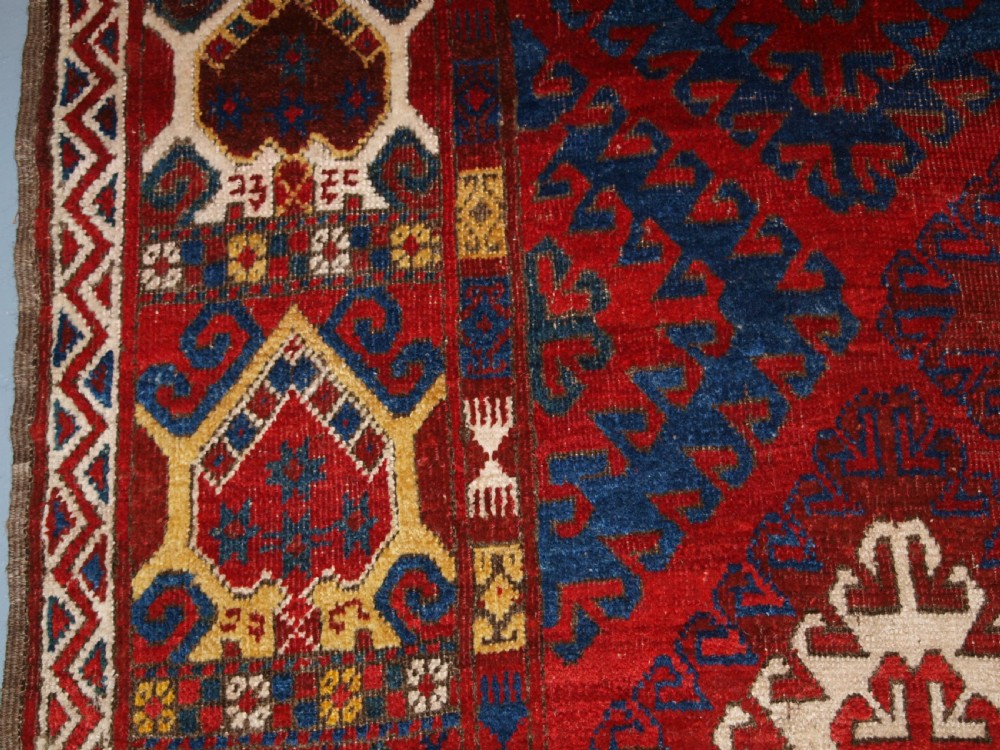 VERY RARE SMALL MAIN CARPET, CENTRAL ASIAN KIRGHYZ OR TURKMEN, MID 19TH CENTURY OR EARLIER. View V