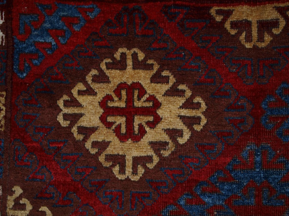 VERY RARE SMALL MAIN CARPET, CENTRAL ASIAN KIRGHYZ OR TURKMEN, MID 19TH CENTURY OR EARLIER. View XI