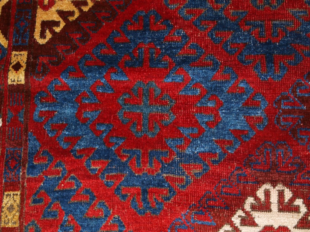 VERY RARE SMALL MAIN CARPET, CENTRAL ASIAN KIRGHYZ OR TURKMEN, MID 19TH CENTURY OR EARLIER. View XIV