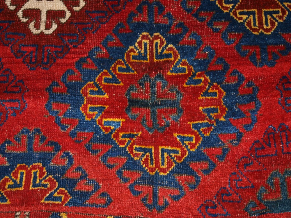 VERY RARE SMALL MAIN CARPET, CENTRAL ASIAN KIRGHYZ OR TURKMEN, MID 19TH CENTURY OR EARLIER. View XVI